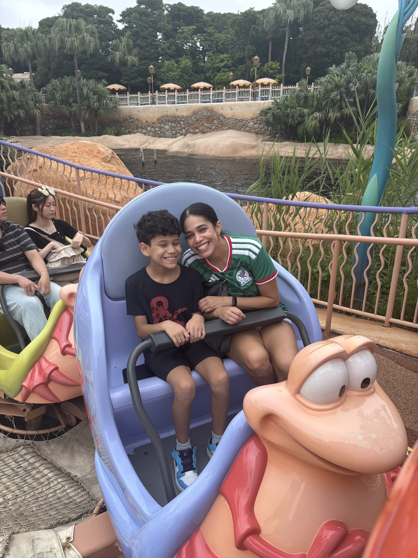 Family enjoying a ride at Tokyo Disney Resort with SAIGROWTH