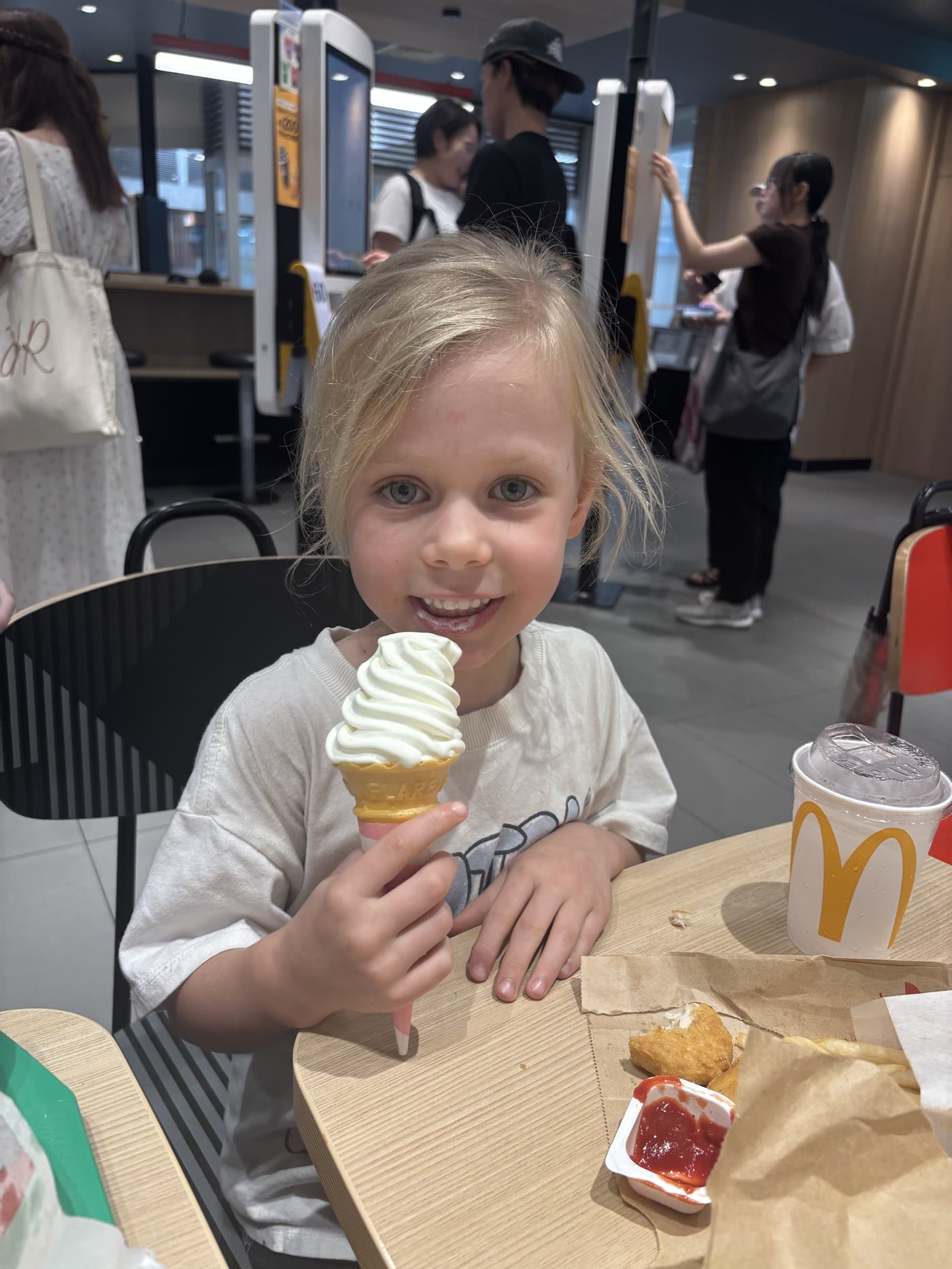 Child enjoying soft-serve ice cream in Tokyo