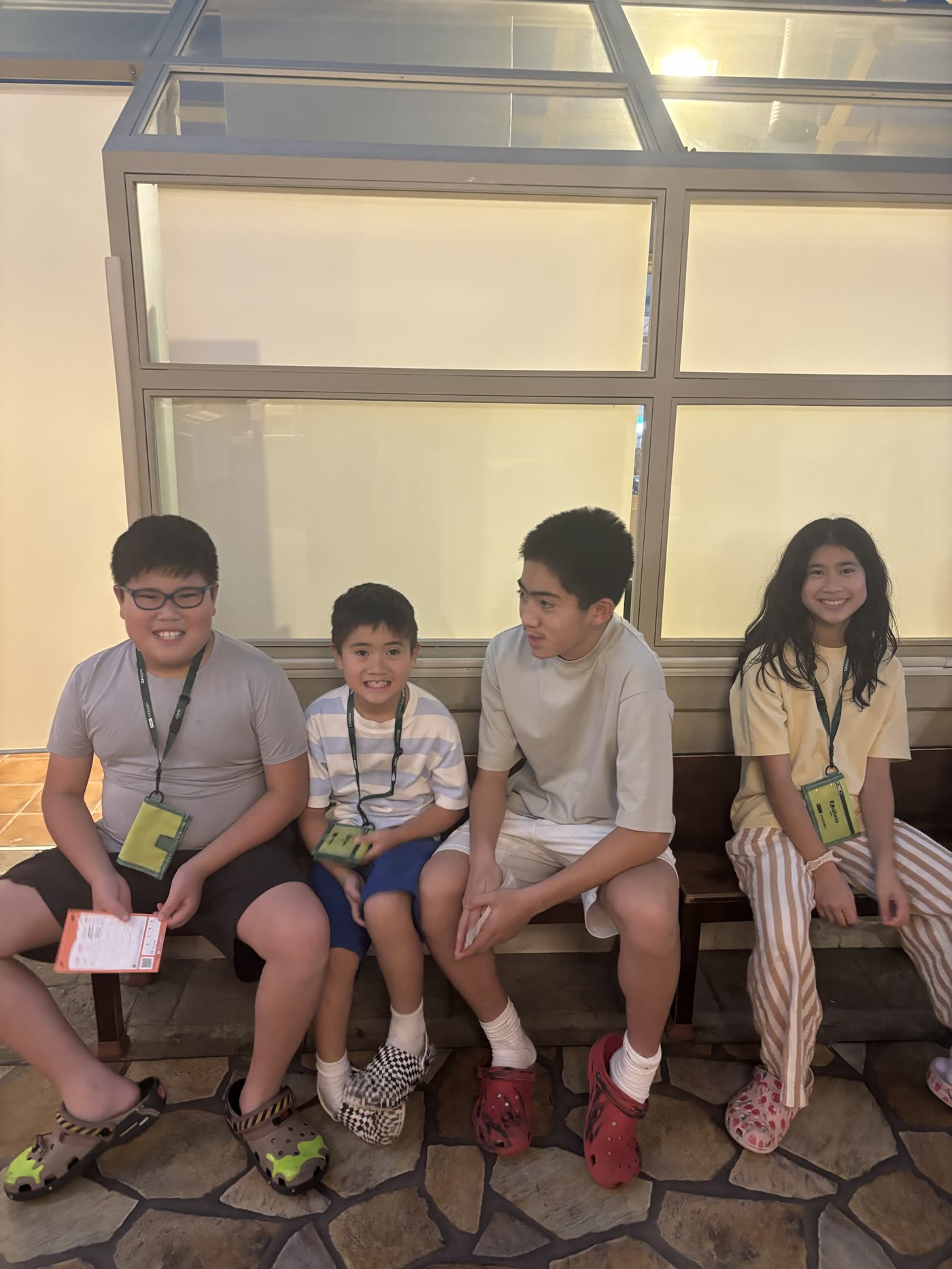 Children at KidZania Tokyo with SAIGROWTH sitter