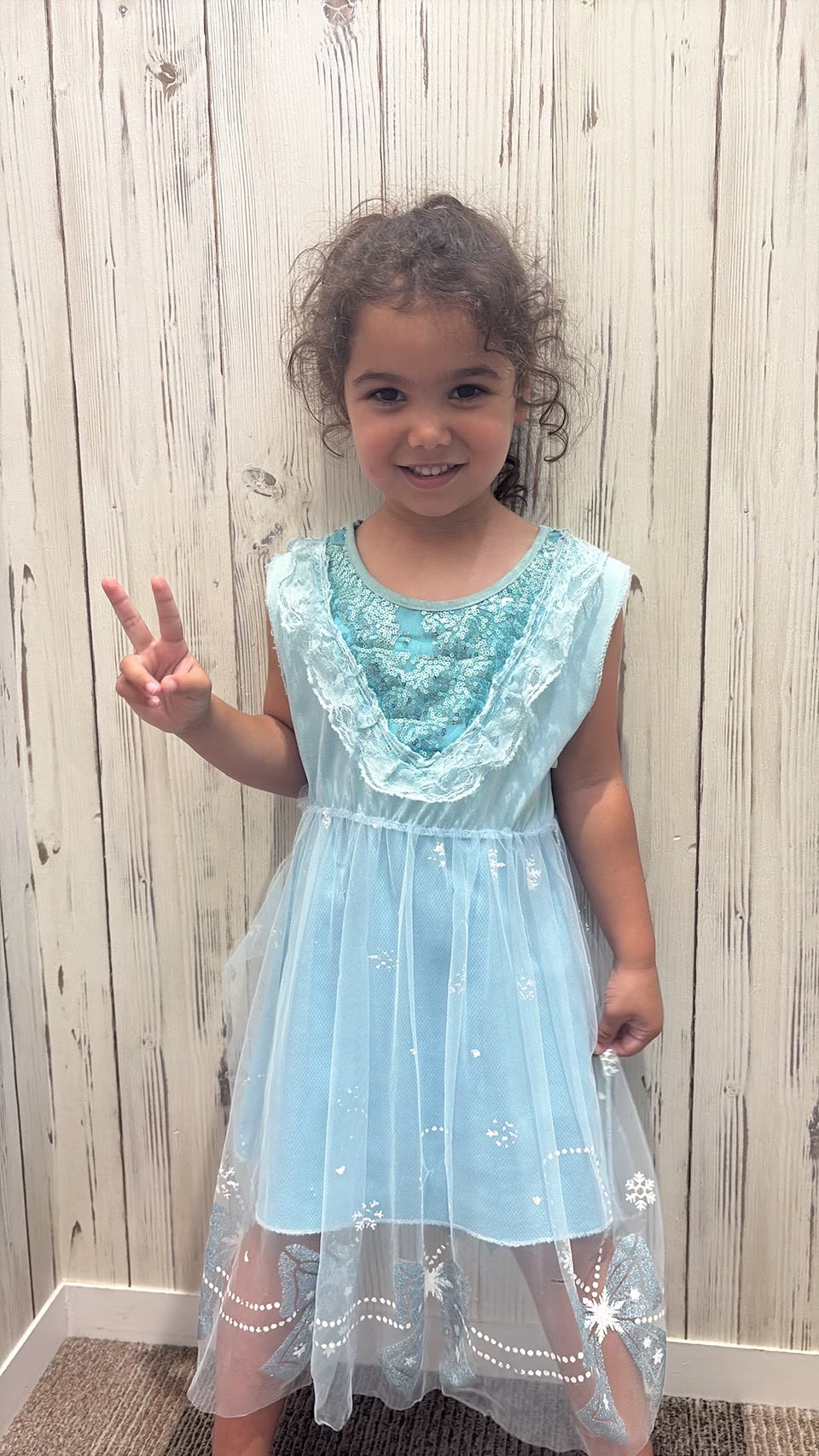 Child in Frozen dress-up at a Tokyo activity