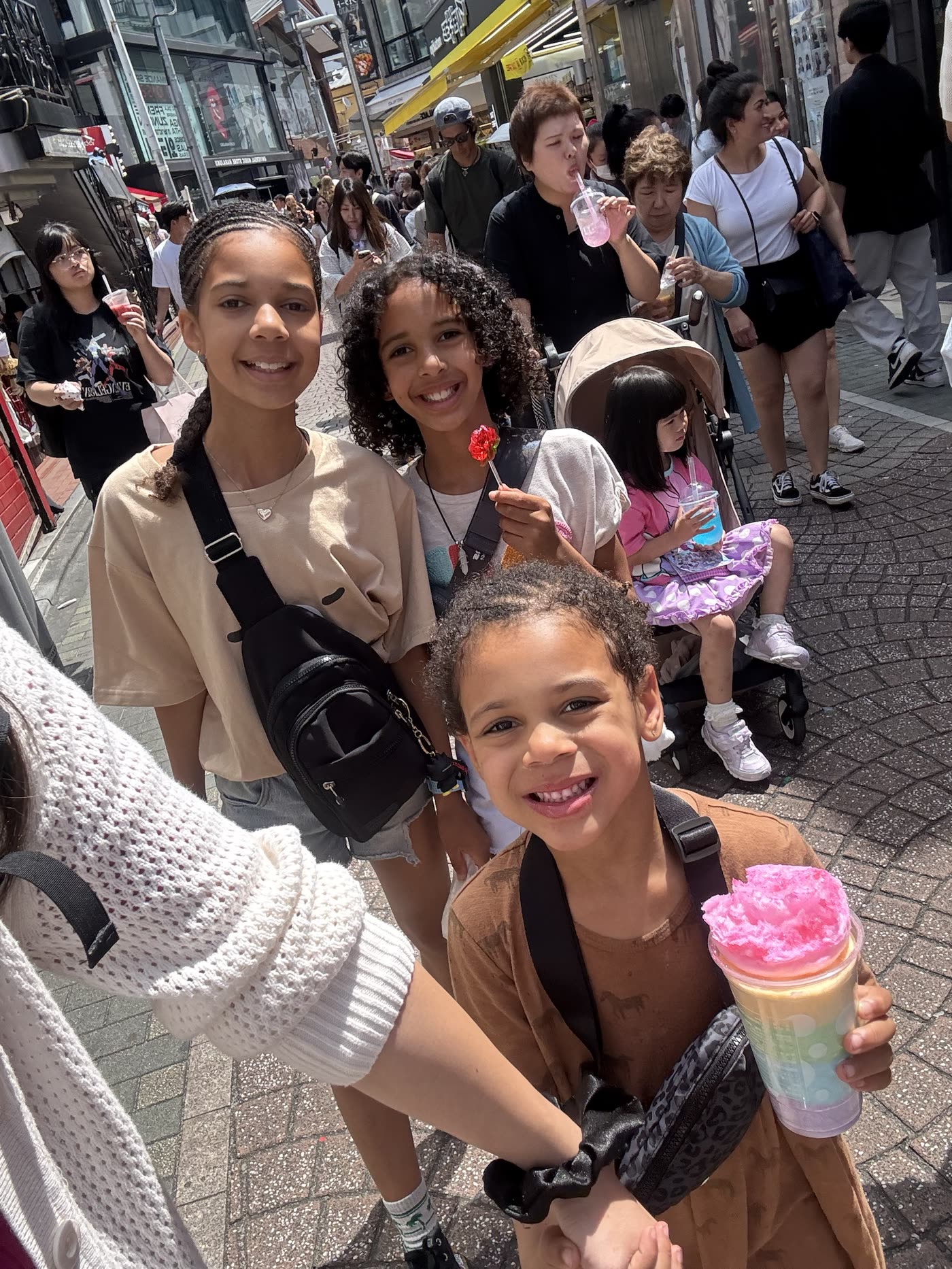 Kids with rainbow cotton candy in Harajuku